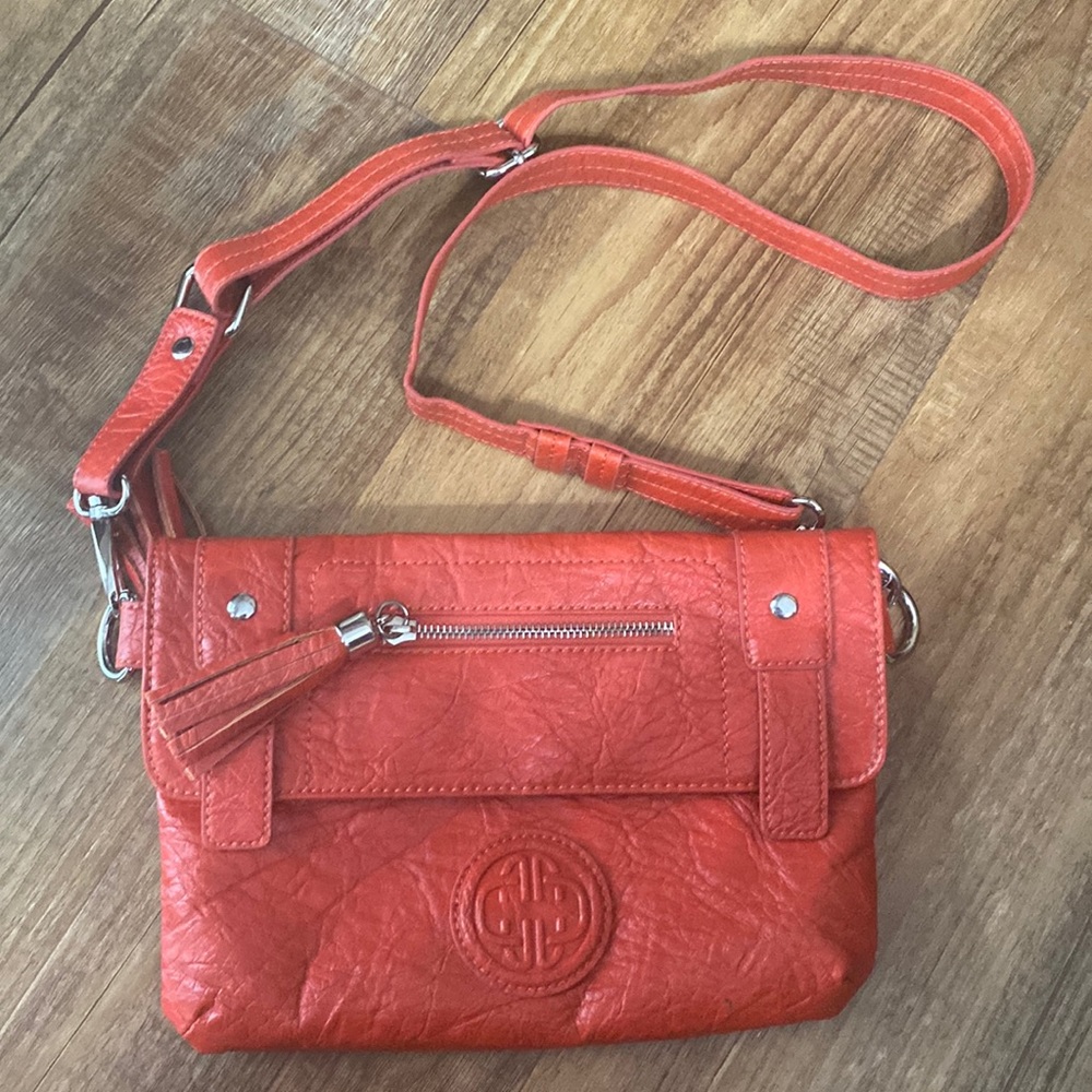 Kate Landry burnt orange purse with floral fabric interior